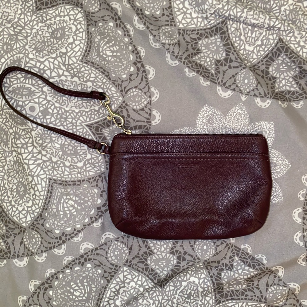 Coach deep purple wristlet w/ silver buckles